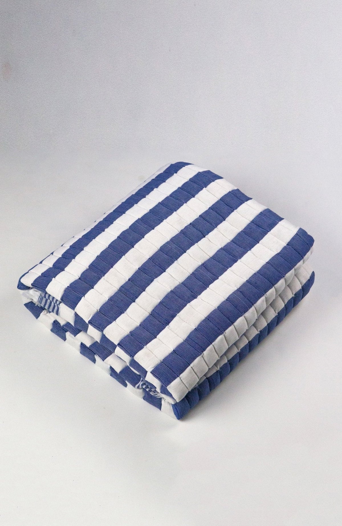 Handwoven Sujani Quilted Throw – Blue & White Stripe